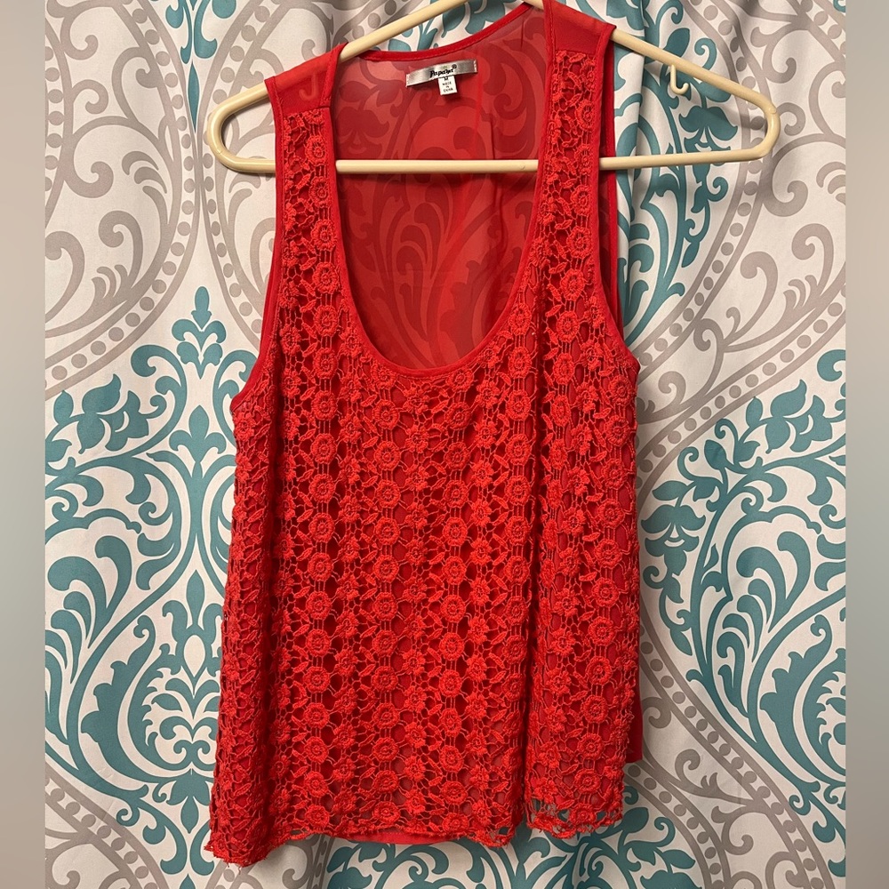 Sheer top with crocheted flowers